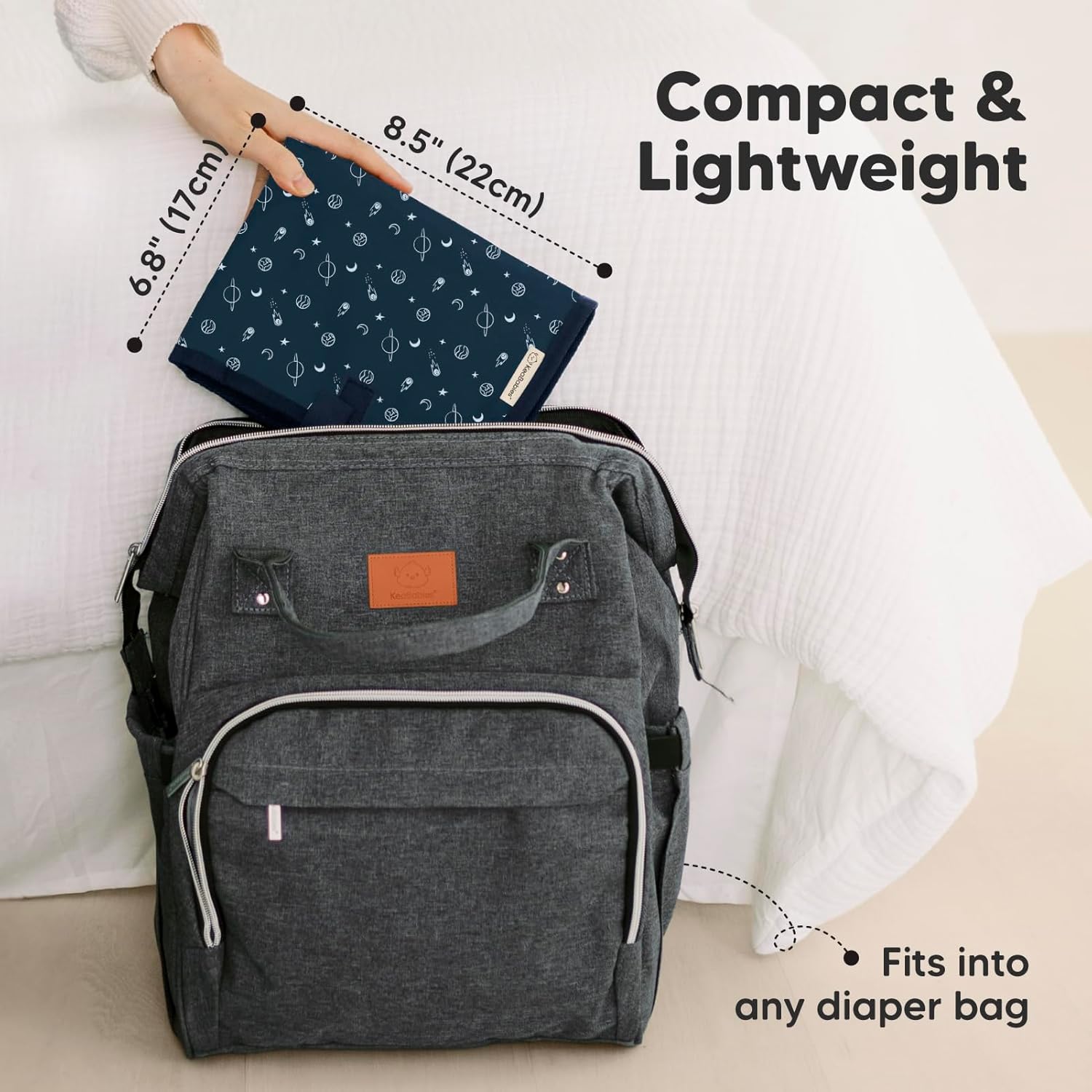 KeaBabies Portable Diaper Changing Pad, Easy Wipe Clean - Foldable Waterproof Baby Changing Mat for Diaper Bag, Compact, Lightweight, 25x13 Baby Changer Travel Essential, Machine Washable (Planets)