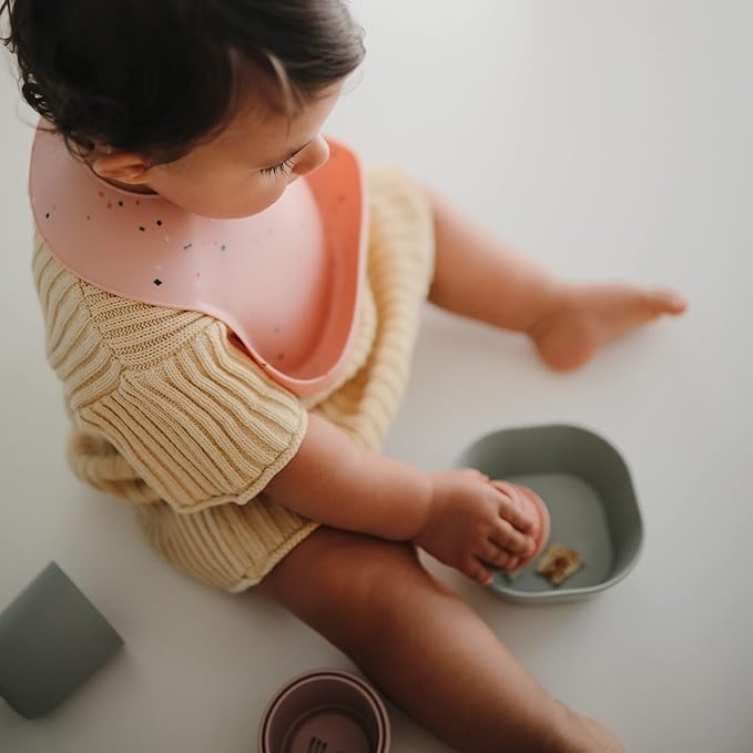 mushie Silicone Baby Bib | Adjustable Fit Waterproof Bibs (Powder Pink Confetti)-BubblyBeeBaby