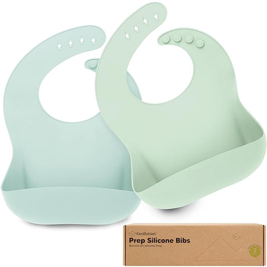 KeaBabies 2-Pack Silicone Baby Bibs for Eating - Sturdy Food-Grade Silicone Bibs for Babies Girl, Boy, Large Food Catcher, Clean & Put On Easily, Waterproof Toddler Feeding Essentials(Pastel Sky)-BubblyBeeBaby