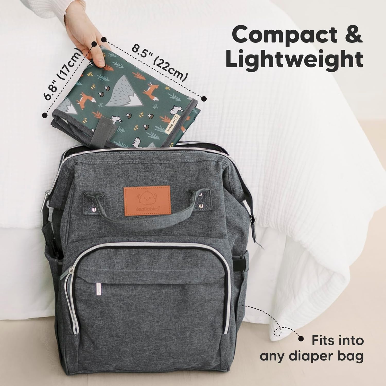 KeaBabies Portable Diaper Changing Pad, Easy Wipe Clean - Foldable Waterproof Baby Changing Mat for Diaper Bag, Compact, Lightweight, 25x13 Baby Changer Travel Essential, Machine Washable (Woods)