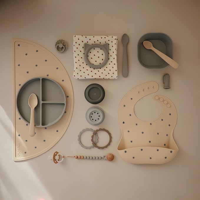 mushie Silicone Baby Bib | Adjustable Fit Waterproof Bibs (Black Daisy)-BubblyBeeBaby