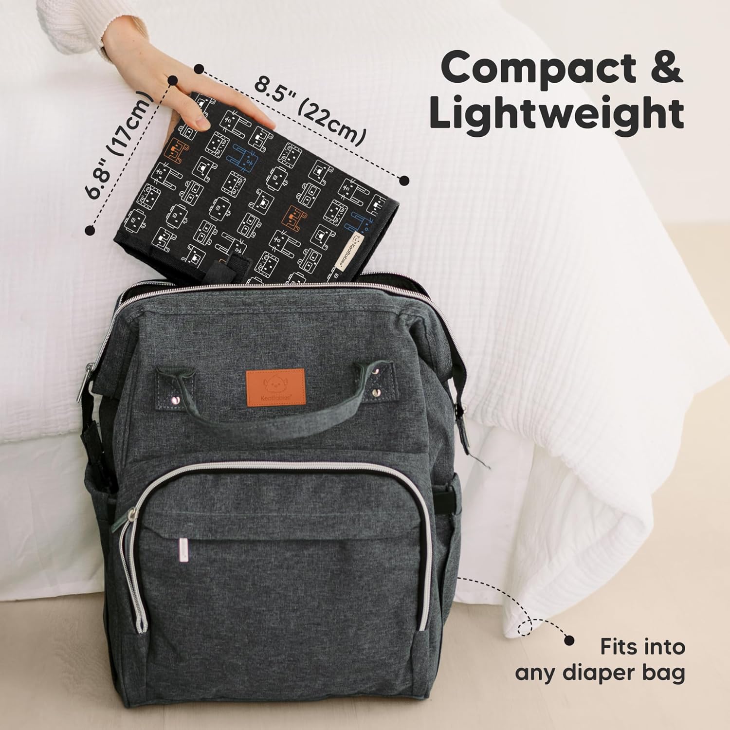 KeaBabies Portable Diaper Changing Pad, Easy Wipe Clean - Foldable Waterproof Baby Changing Mat for Diaper Bag, Compact, Lightweight, 25x13 Baby Changer Travel Essential, Machine Washable (Pixel)