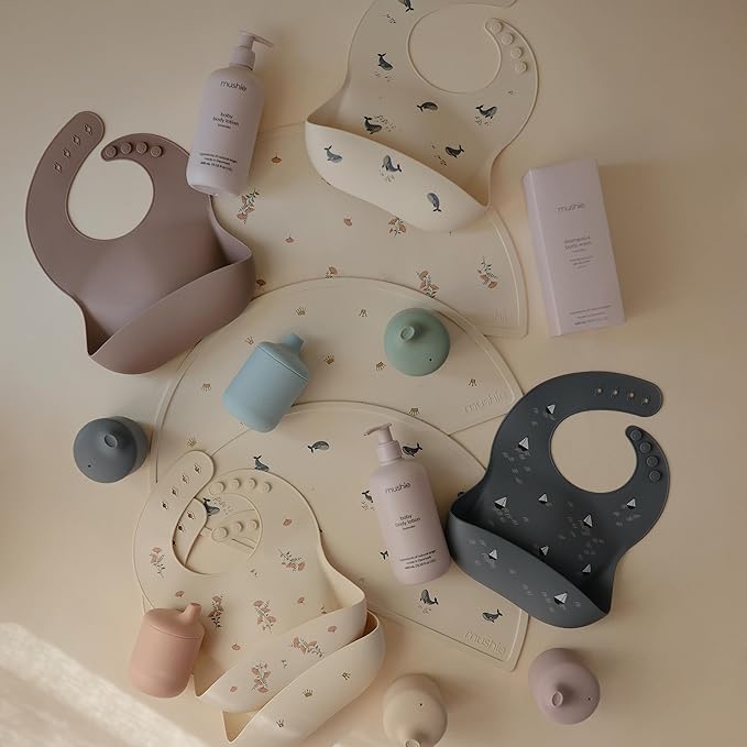 mushie Silicone Baby Bib | Adjustable Fit Waterproof Bibs (Pink Flowers)-BubblyBeeBaby